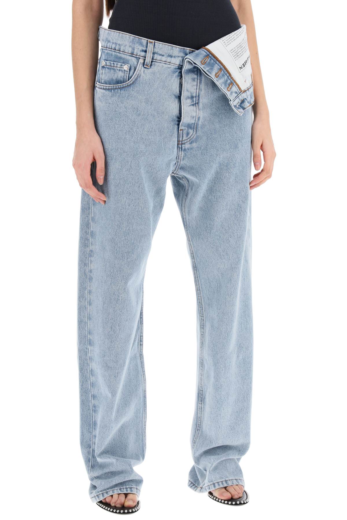 Y PROJECT asymmetric waist jeans with seven