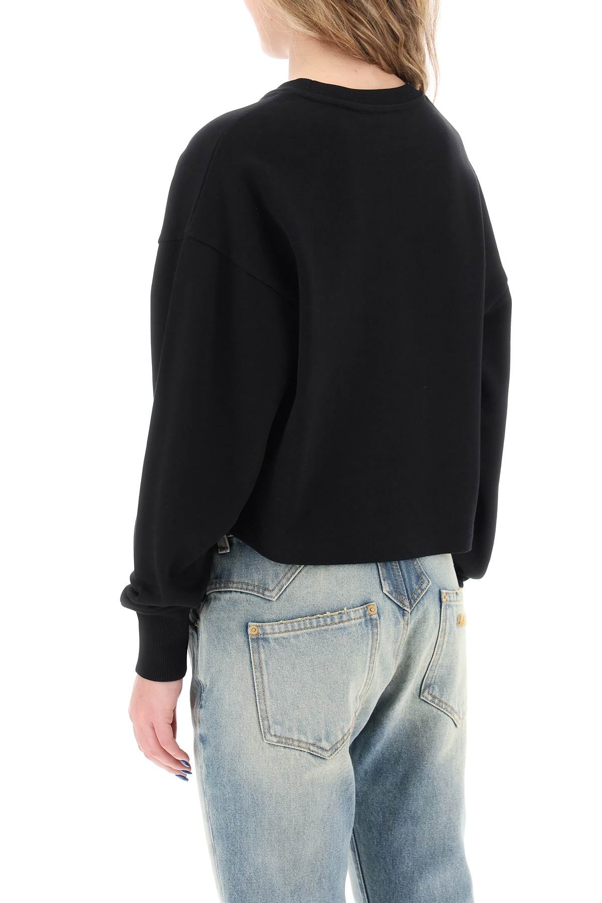 BALMAIN cropped sweatshirt with flocked logo