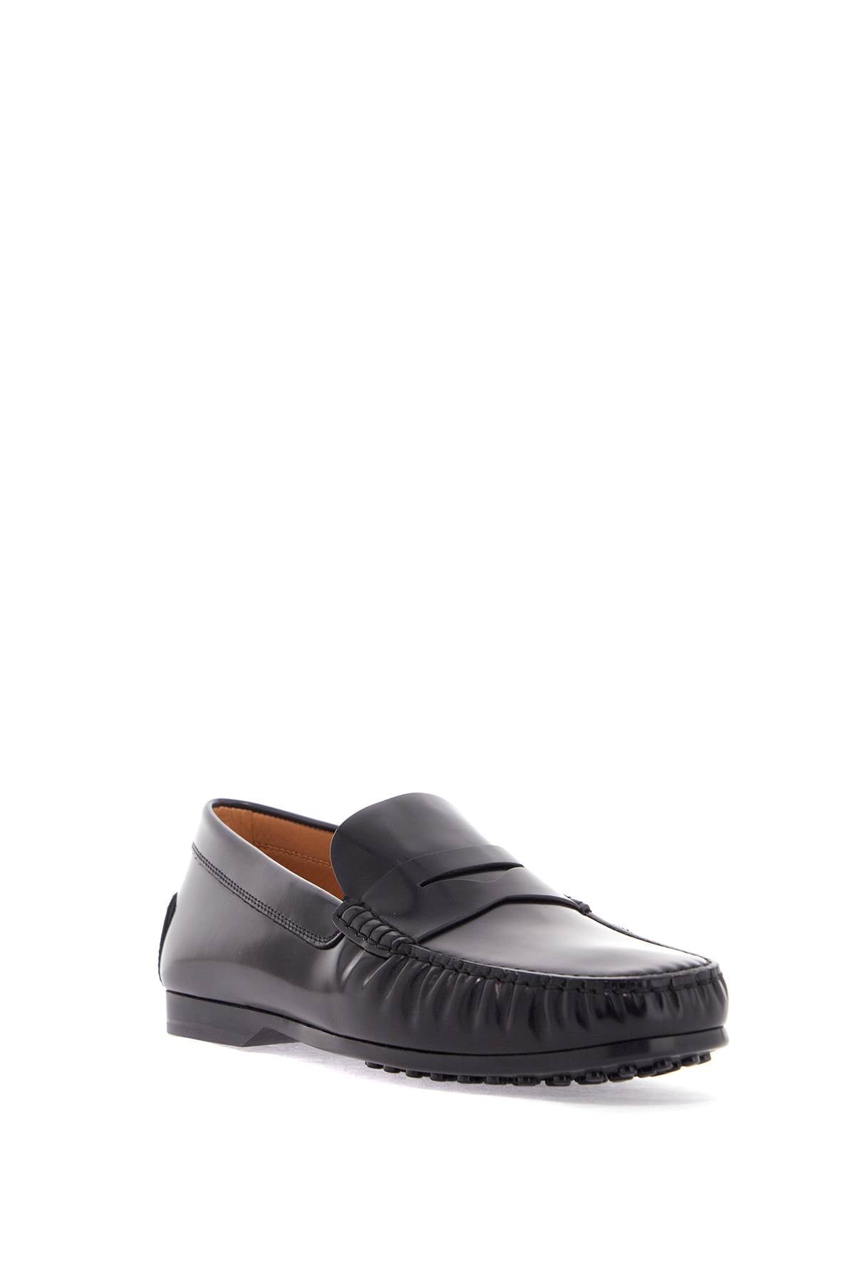 TOD'S men's black calfskin loafers with elegant insert and rubber sole